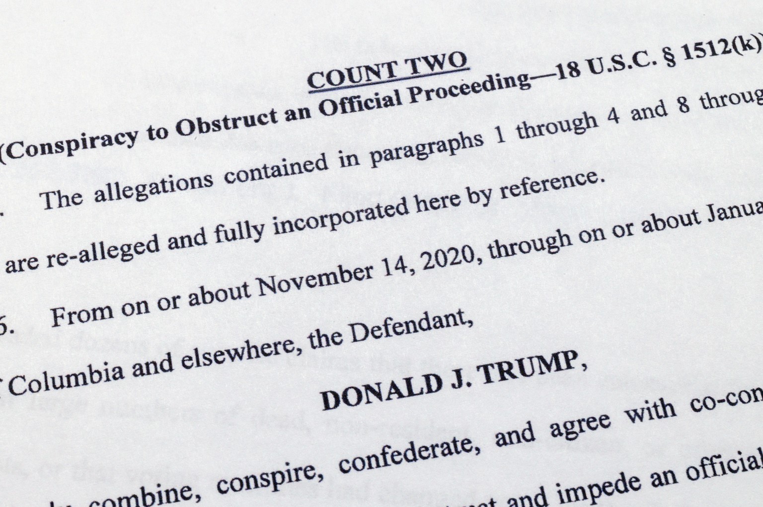 The indictment against former President Donald Trump charging him by the Justice Department for his efforts to overturn the results of the 2020 presidential election is photographed Tuesday, Aug. 1, 2 ...