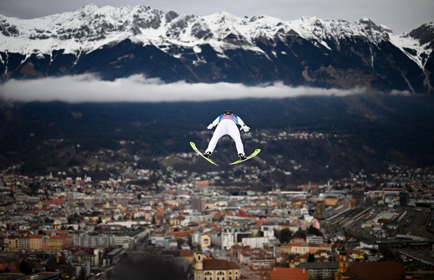 epa10388703 Jan Hoerl of Austria in action during a trial round for the third stage of the 71st Four Hills Ski Jumping Tournament in Innsbruck, Austria, 04 January 2023. EPA/Christian Bruna