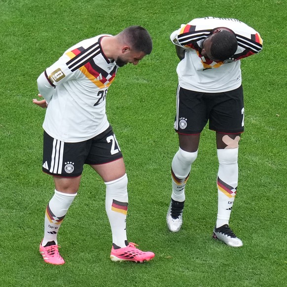 Germany's Deniz Undav (26) celebrates his goal with teammate Antonio Ruediger (2) during the World Cup Group E soccer match between Germany and Curacao in Houston, Sunday, June 14, 2026. (AP Phot ...