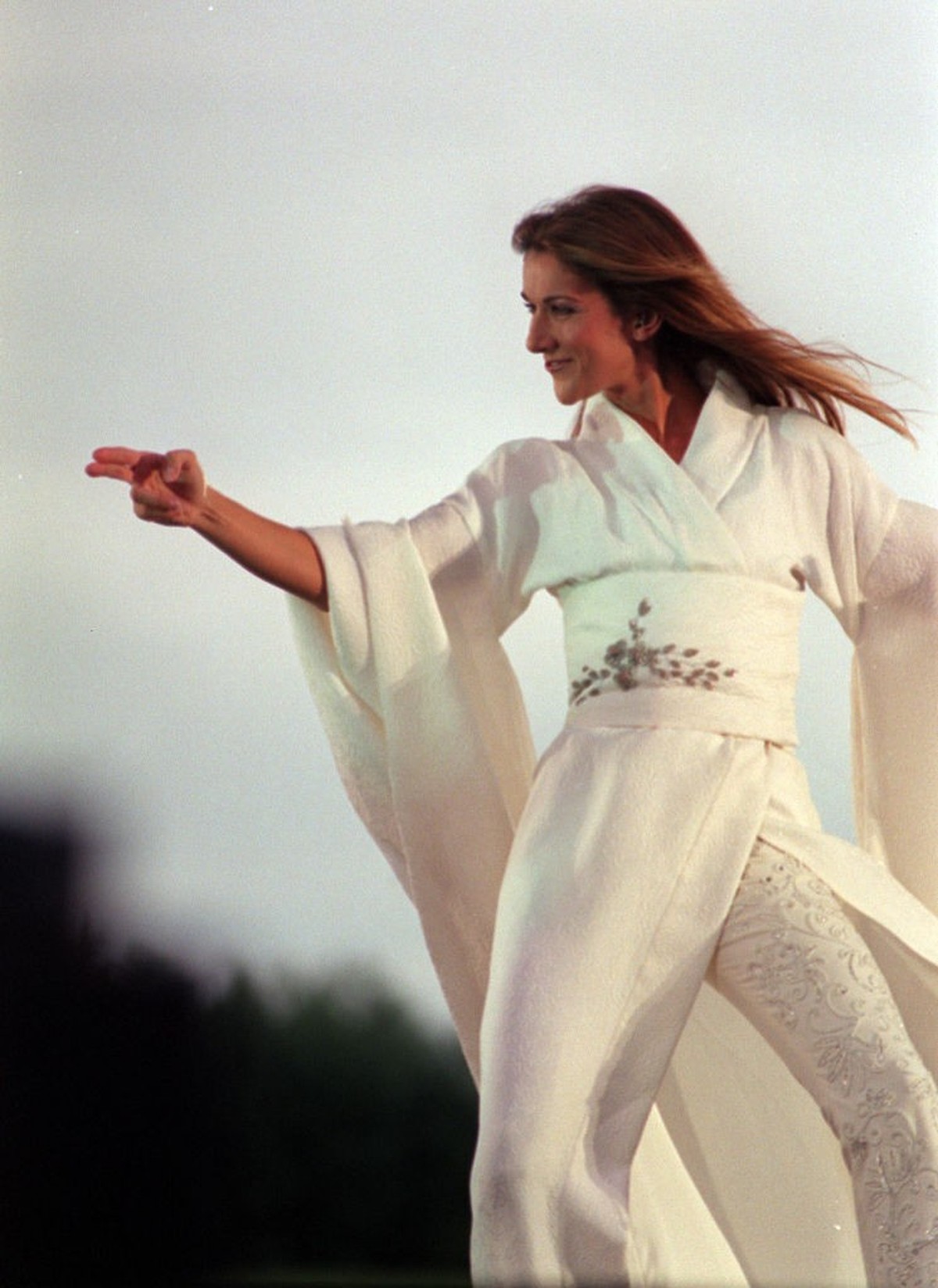 Canadian singer Celine Dion performs on stage at the the Don Valley Stadium in Sheffield, on the first date of her UK tour. (Photo by Malcolm Croft - PA Images/PA Images via Getty Images)