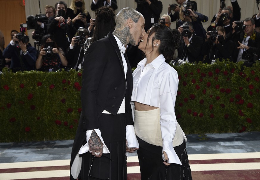 Travis Barker, left, and Kourtney Kardashian attend The Metropolitan Museum of Art&#039;s Costume Institute benefit gala celebrating the opening of the &quot;In America: An Anthology of Fashion&quot;  ...