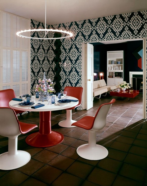 House &amp; Garden August 1969 Architecture
Dining room with furniture of molded white plastic and red vinyl upholstery by Georg Jenson, blue tableware also by Jenson, chandelier by Lightolier, Aztec  ...