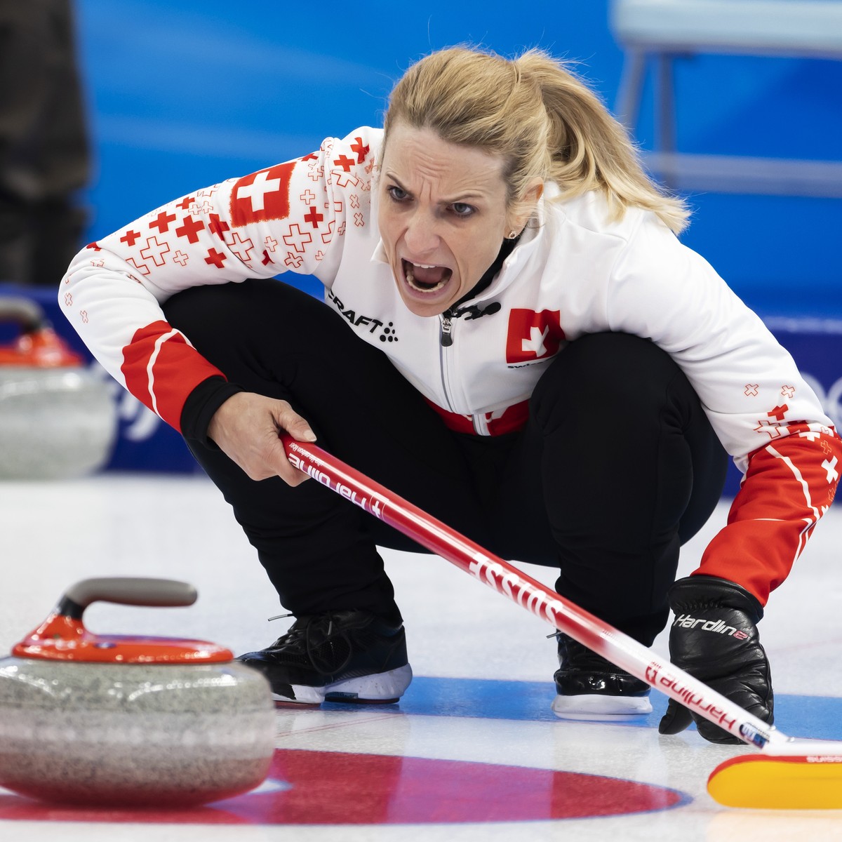 Switzerland skip Silvana Tirinzoni directs her teammates during the women's Round Robin #2 game between China and Switzerland at the National Aquatics Centre at the 2022 Olympic Winter Games in B ...