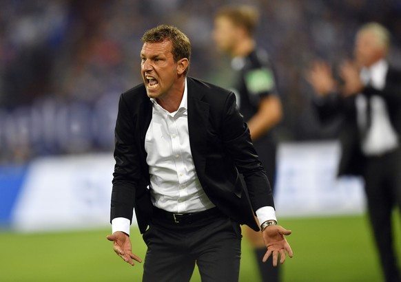 Schalke head coach Markus Weinzierl reacts during the German Bundesliga soccer match between FC Schalke 04 and Bayern Munich in Gelsenkirchen, Germany, Friday, Sept. 9, 2016. (AP Photo/Martin Meissner ...