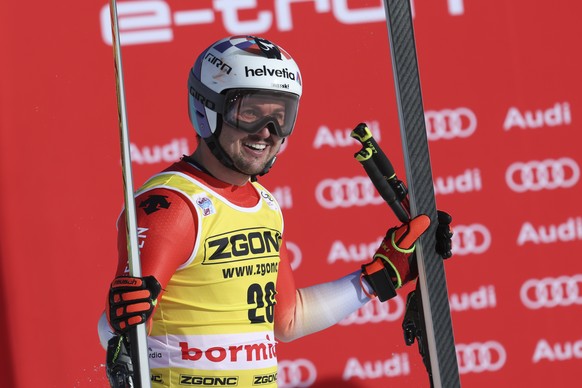 Switzerland&#039;s Urs Kryenbuehl smiles after completing an alpine ski, men&#039;s World Cup downhill race, in Bormio, Italy, Wednesday, Dec.28, 2022. (AP Photo/Alessandro Trovati)