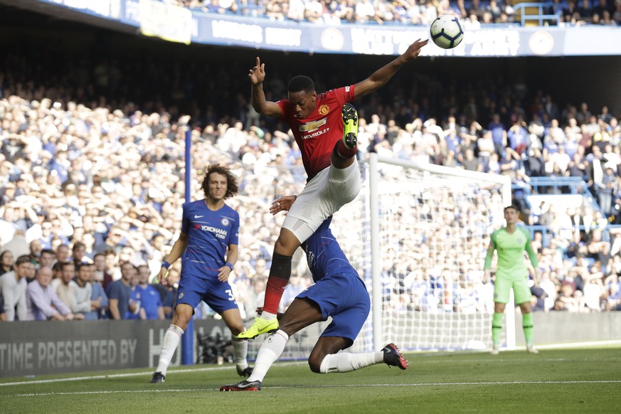 ManU forward Anthony Martial jumps to head the ball with Chelsea&#039;s Antonio Ruediger during their English Premier League soccer match between Chelsea and Manchester United at Stamford Bridge stadi ...