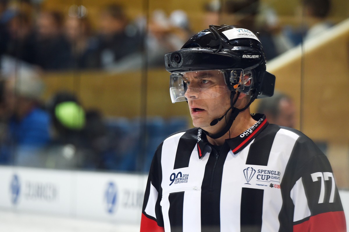 Headreferee Tobias Wehrli with a helmetcamera for the tv during the game between Switzerland's HC Lugano and Avtomobilist Yekaterinburg at the 90th Spengler Cup ice hockey tournament in Davos, Sw ...