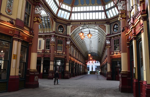 epa08341523 A deserted Leadenhall market in the heart of the City of London in London, Britain, 03 April 2020. The United Kingdom is heading to the deepest recession since the financial crisis in 2008 ...