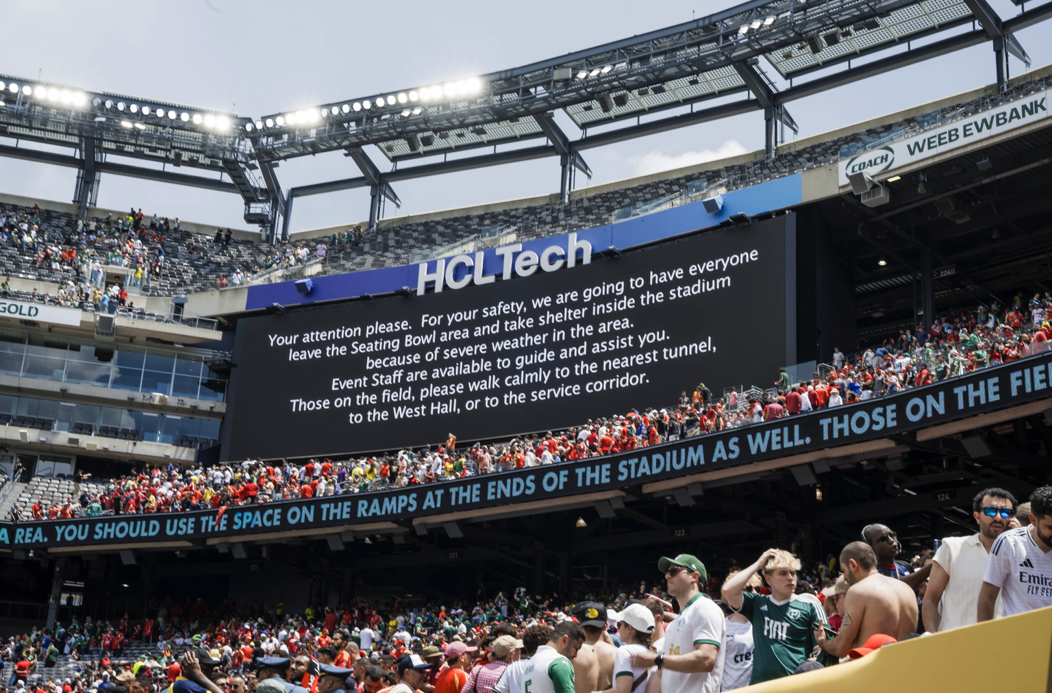 SE Palmeiras v Al Ahly FC - FIFA Club World Cup A giant screen display a notice that the match is suspended due to extreme weather during the FIFA Club World Cup football match between SE Palmeiras an ...
