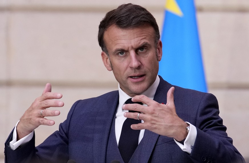 epa11310223 French President Emmanuel Macron speaks during a joint press conference with the president of the Democratic Republic of the Congo following their meeting at the Elysee Palace in Paris, Fr ...
