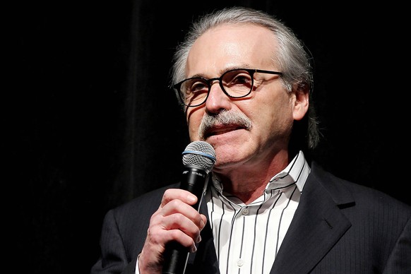 FILE - David Pecker, Chairman and CEO of American Media, addresses those attending the Shape &amp; Men&#039;s Fitness Super Bowl Party in New York, on Jan. 31, 2014. (Marion Curtis via AP, File)