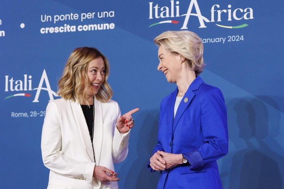 FILE - Italian Premier Giorgia Meloni, left, shares a light moment as she welcomes President of the European Commission Ursula von der Leyen on Jan. 29, 2024. It seemed like a throwaway line by Europe ...