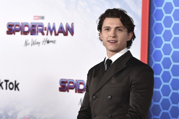 FILE - Tom Holland appears at the premiere of &quot;Spider-Man: No Way Home&quot; in Los Angeles on Dec. 13, 2021. (Photo by Jordan Strauss/Invision/AP, File)
Tom Holland