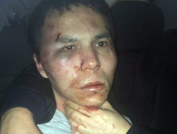epa05722503 A handout photo released on 16 January 2017 by the Turkish police and obtained through Depo Photos shows the main suspect of the Reina nightclub shooting, Abdulkadir Masharipov, seen after ...