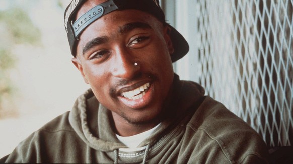 FILE - This 1993 file photo originally provided by Columbia Pictures shows rap musician Tupac Shakur is shown in a scene from, &quot;Poetic Justice.&quot; The upcoming Broadway musical inspired by Tup ...