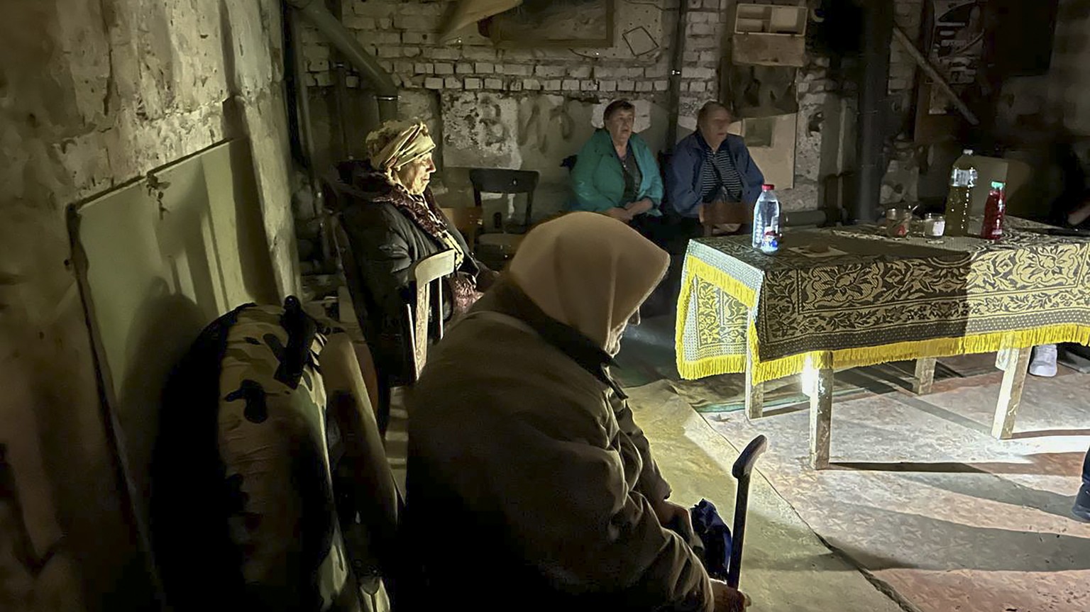 epa10664804 A handout photo made available by the Governor of Russia&#039;s Belgorod region Vyacheslav Gladkov on his Telegram channel shows people waiting inside a bomb shelter during a Ukrainian she ...