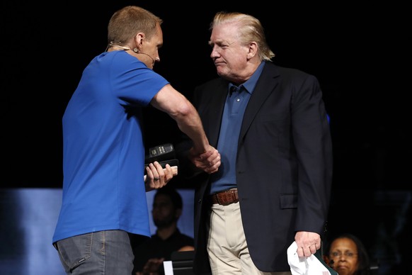 President Donald Trump shakes hands with Pastor David Platt after Platt prayed for him at McLean Bible Church, in Vienna, Va., Sunday June 2, 2019. (AP Photo/Jacquelyn Martin)