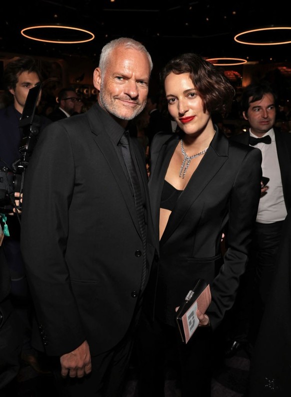 BEVERLY HILLS, CALIFORNIA - JANUARY 10: 80th Annual GOLDEN GLOBE AWARDS -- Pictured: (l-r) Martin McDonagh and Phoebe Waller-Bridge attend the 80th Annual Golden Globe Awards held at the Beverly Hilto ...