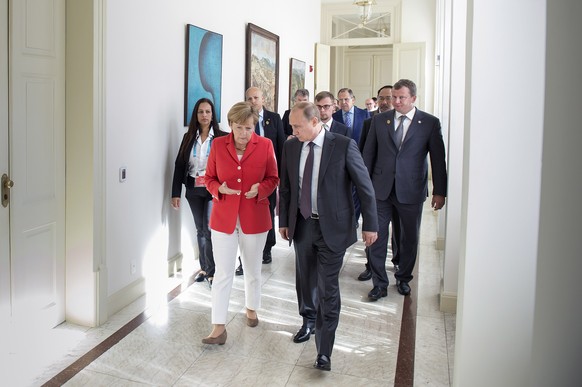 Angela Merkel und Wladimir Putin am 13. Juli 2014 in Rio de Janeiro.