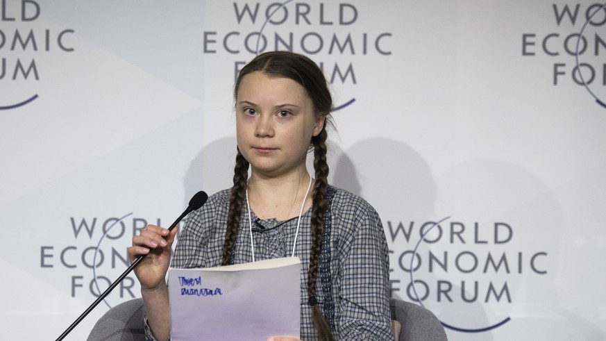 epa07317510 Swedish climate activist Greta Thunberg, 16, speaks during a panel session at the 49th annual meeting of the World Economic Forum (WEF) in Davos, Switzerland, 25 January 2019. The meeting  ...