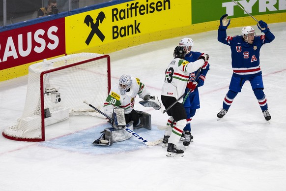 USA's Ryan Leonard, right, celebrates after the 1-0 goal from teammate USA's Justin Faulk (not in the picture) during the 2026 IIHF Men's Ice Hockey World Championship preliminary round ...