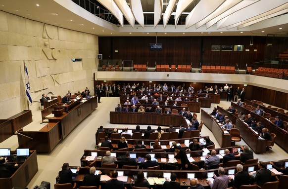 Israeli lawmakers attend a vote on a bill at the Knesset, the Israeli parliament, in Jerusalem February 6, 2017. REUTERS/Ammar Awad