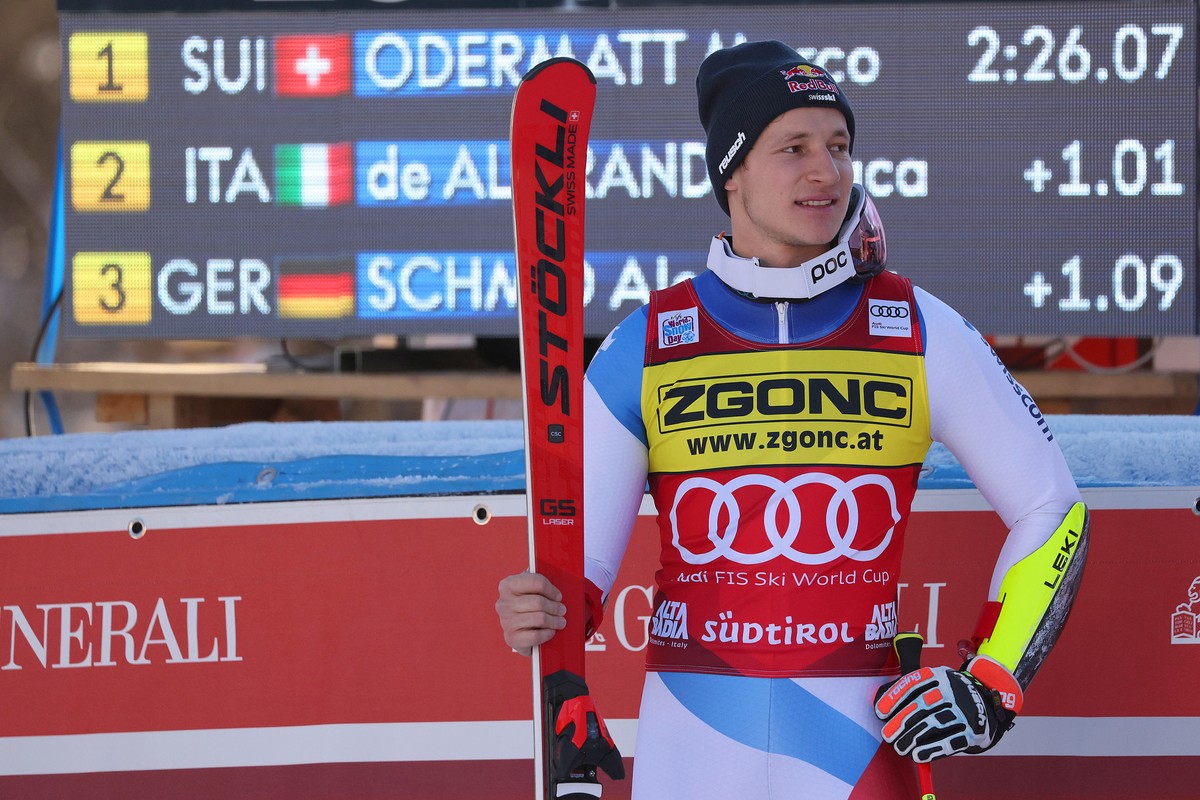 epa09651749 Winner Marco Odermatt of Switzerland reacts in the finish area during the Men's Giant Slalom race at the FIS Alpine Skiing World Cup in Alta Badia, Italy, 20 December 2021. EPA/LUCIAN ...
