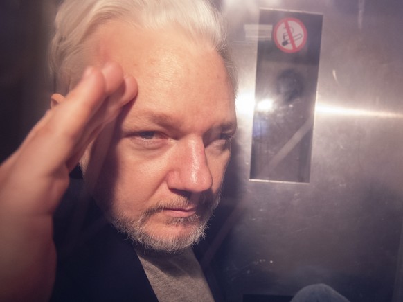 epa07622698 (FILE) - Wikileaks co-founder Julian Assange, in a prison van, as he leaves Southwark Crown Court in London, Britain, 01 May 2019 (reissued 03 June 2019). Reports on 03 June 2019 state Upp ...