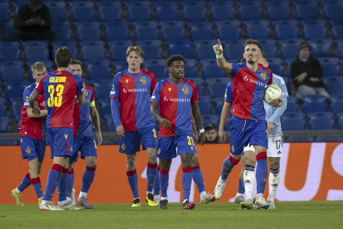 Basel's Andi Zeqiri, right, cheers after scoring during the UEFA Conference League round of 16 first leg match between Switzerland's FC Basel 1893 and Slovakia's SK Slovan Bratislava at ...