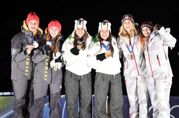epa12728597 (L-R) Silver medal winners Dajana Eitberger and Magdalena Matschina of Germany, gold medal winners Andrea Voetter and Marion Oberhofer of Italy and bronze medal winners Selina Egle and Lar ...