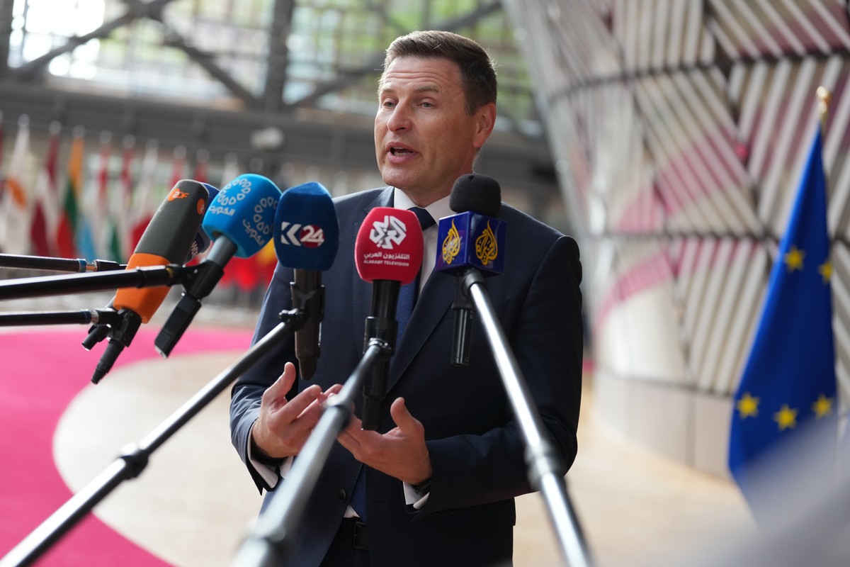 Estonia's Defense Minister Hanno Pevkur speaks with the media as he arrives for a meeting of EU defense ministers at the European Council building in Brussels, Tuesday, May 12, 2026. (AP Photo/Vi ...