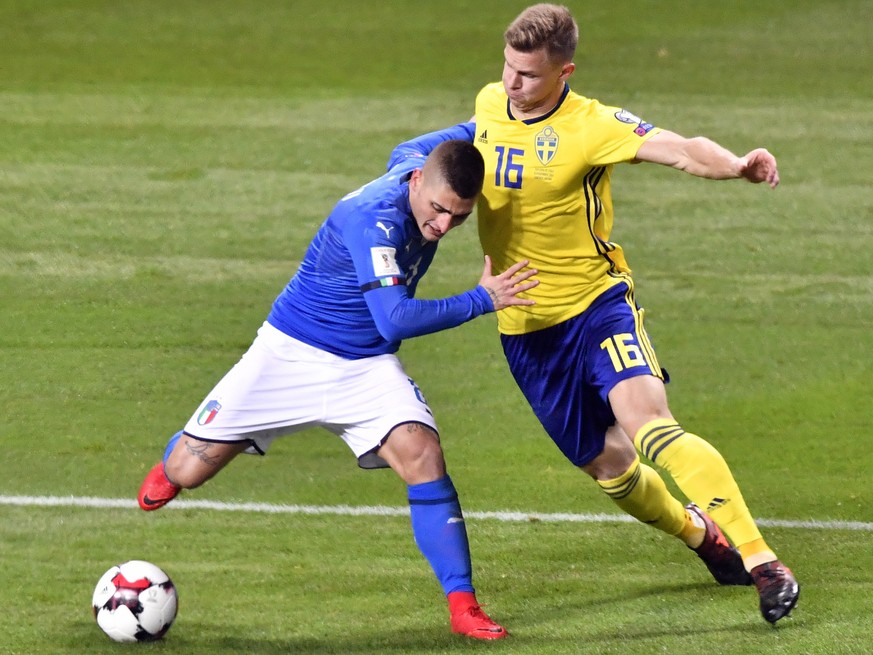 Italy's Marco Verratti, left, and Sweden's Emil Krafth battle for the ball during the World Cup qualifying play-off first leg soccer match between Sweden and Italy, at the Friends Arena in Stockholm,  ...