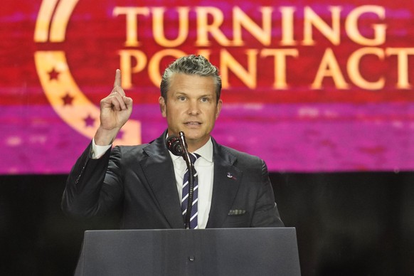 Defense Secretary Pete Hegseth speaks at a memorial for conservative activist Charlie Kirk, Sunday, Sept. 21, 2025, at State Farm Stadium in Glendale, Ariz. (AP Photo/John Locher)
Charlie Kirk Memoria ...