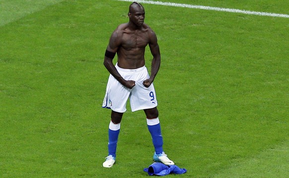 Italy's Mario Balotelli celebrates scoring his side's second goal during the Euro 2012 soccer championship semifinal match between Germany and Italy in Warsaw, Poland, Thursday, June 28, 201 ...