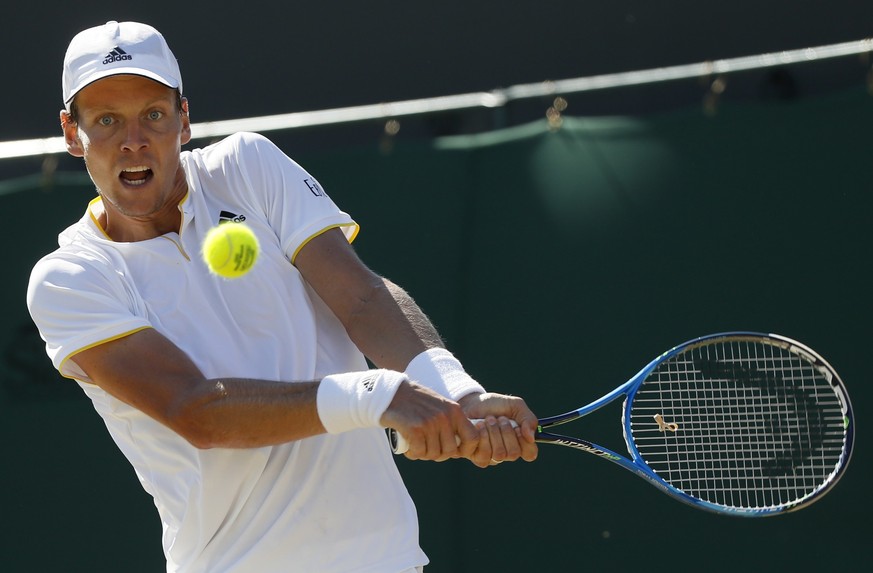 Czech Republic&#039;s Tomas Berdych returns to Spain&#039;s David Ferrer during their Men&#039;s Singles Match on day six at the Wimbledon Tennis Championships in London Saturday, July 8, 2017. (AP Ph ...