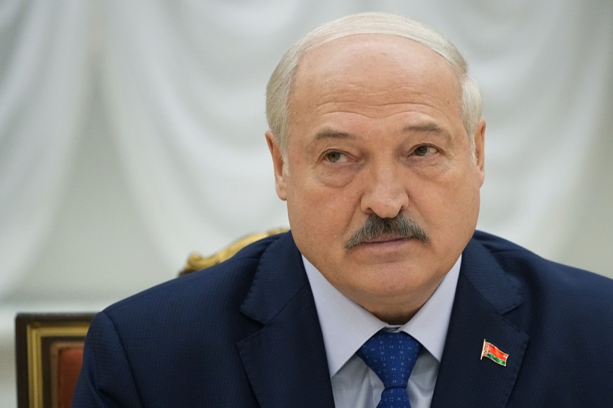 FILE - Belarusian President Alexander Lukashenko listens, during his meeting with foreign correspondents, in Minsk, Belarus, on July 6, 2023. A former member of Lukashenko?s special security forces is ...