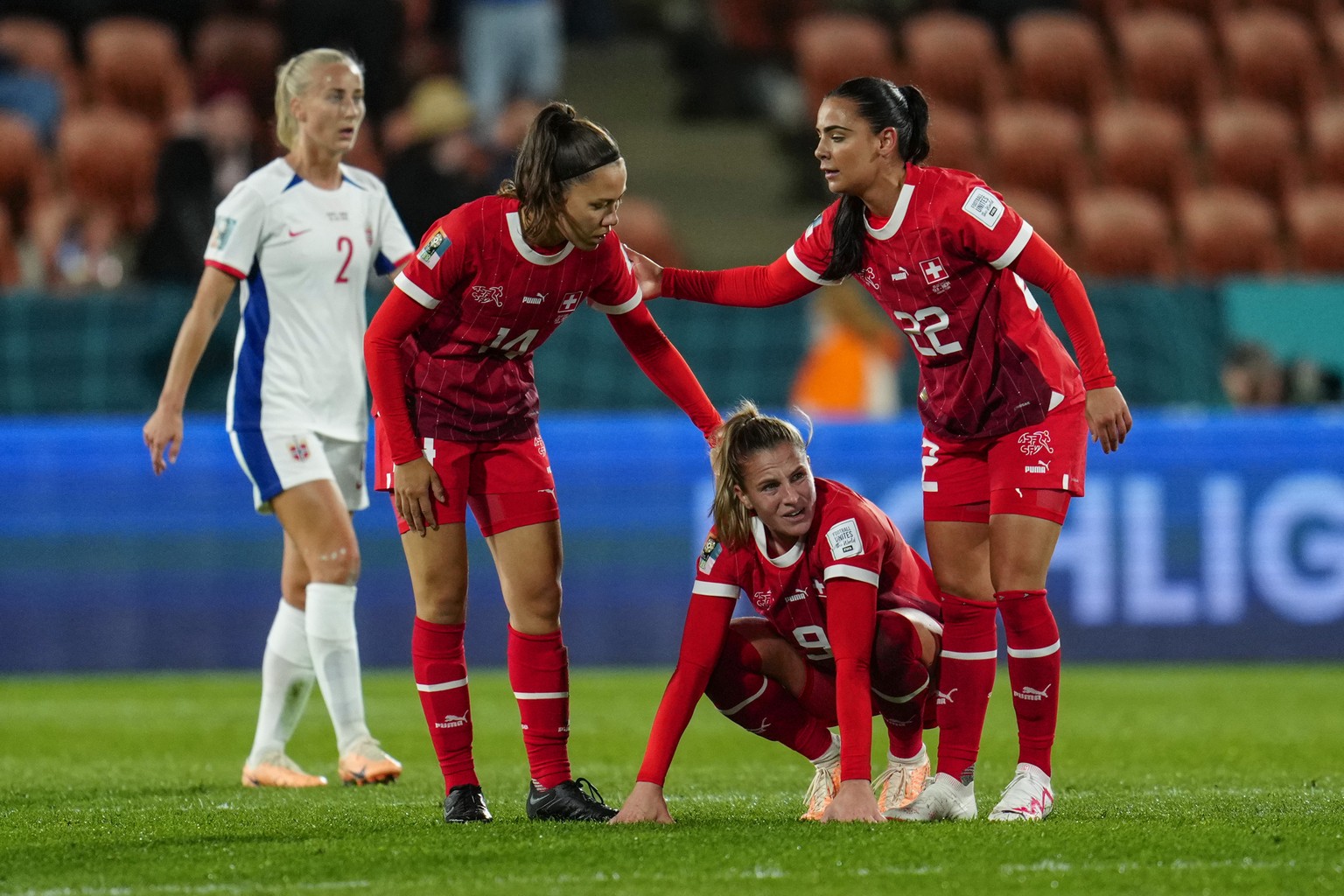 Switzerland&#039;s Marion Rey, Ana Maria Crnogorcevic and Meriame Terchoun, from left, stand at the pitch at the end of the Women&#039;s World Cup Group A soccer match between Switzerland and Norway i ...