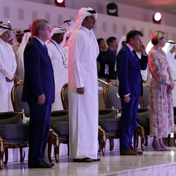 epa07875207 (Second L-R) International Olympic Committee (IOC) president Thomas Bach of Germany, Sheikh Tamim bin Hamad Al Thani, Emir of Qatar, IAAF president Sebastian Coe of Britain, and Coe&#039;s ...