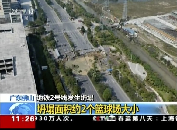 In this image taken from video footage run by China&#039;s CCTV via AP Video, a section of collapsed road is seen in Foshan in southern China&#039;s Guangdong Province, Thursday, Feb. 8, 2018. Chinese ...