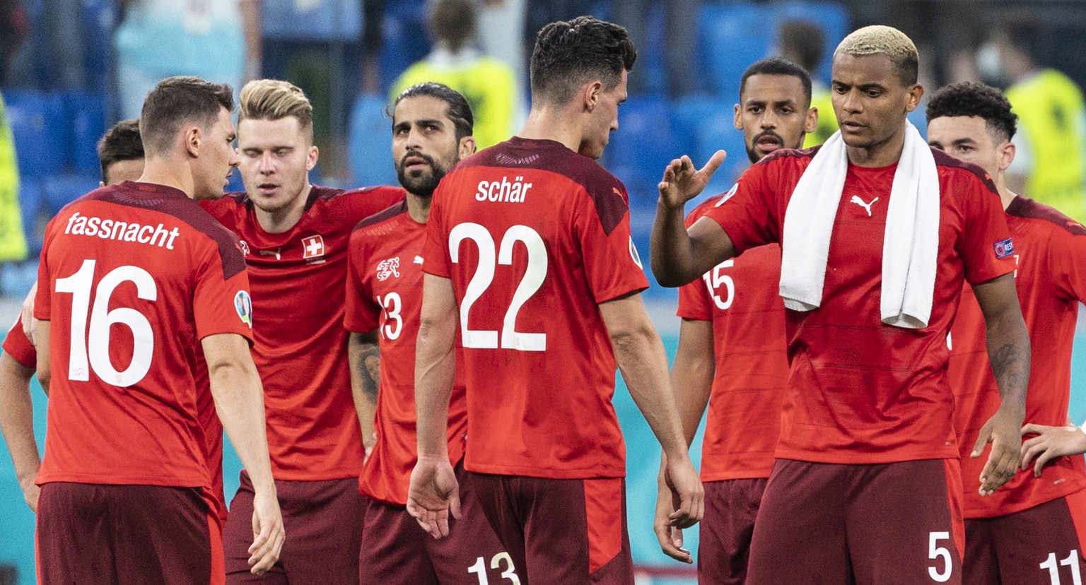 Switzerland&#039;s defender Manuel Akanji, nr. 5, comforts defender Fabian Schaer, nr 22, who just missed a penalty, before missing himself, during the UEFA Euro 2020 soccer tournament quarterfinal so ...