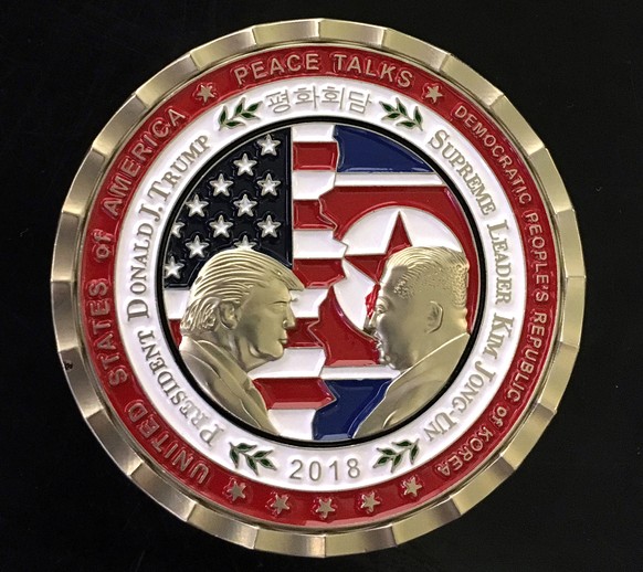 epa06760142 Front view of the US and North Korea Peace Talks commemorative &#039;Challenge Coin&#039; celebrating the possible upcoming talks in Singapore between US President Donald J. Trump and Nort ...