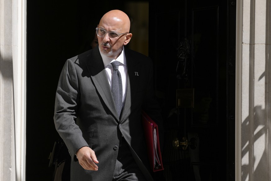 FILE - Britain&#039;s Secretary of State for Education Nadhim Zahawi leaves after attending a cabinet meeting at 10 Downing Street in London, June 7, 2022. The contest to succeed British Prime Ministe ...