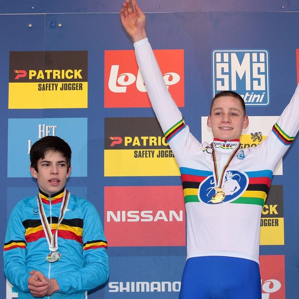 - KOKSIJDE, BELGIUM: (L-R) Belgian Wout Van Aert (2nd place), Dutch Mathieu van der Poel (1st place) and French Quentin Jauregui (3rd place) pictured on the podium after the junior race at the Cyclocr ...