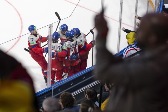 epa12972179 Czechia's players celebrate a goal during the 2026 IIHF Men's Ice Hockey World Championship preliminary round group B game between Sweden and the Czech Republic in Fribourg, Swit ...