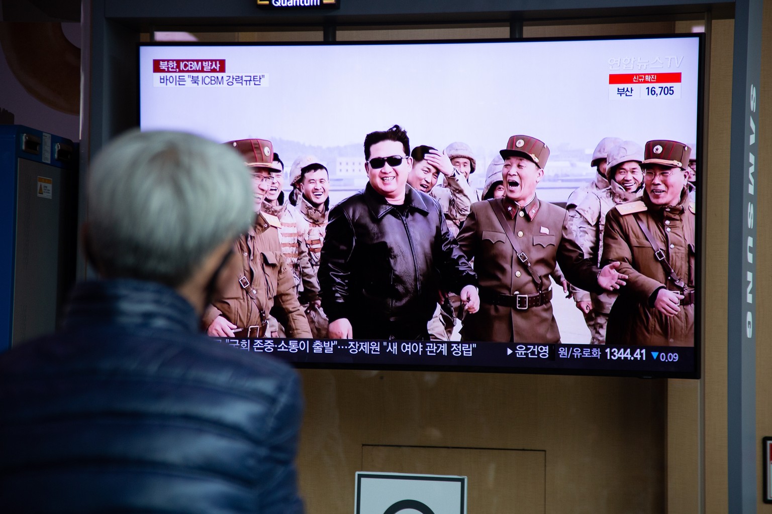 epa09848220 A man watches the news at a station in Seoul, South Korea, 25 March 2022. According to South Korea's national defense ministry on 25 March, North Korea launched a new intercontinental ...