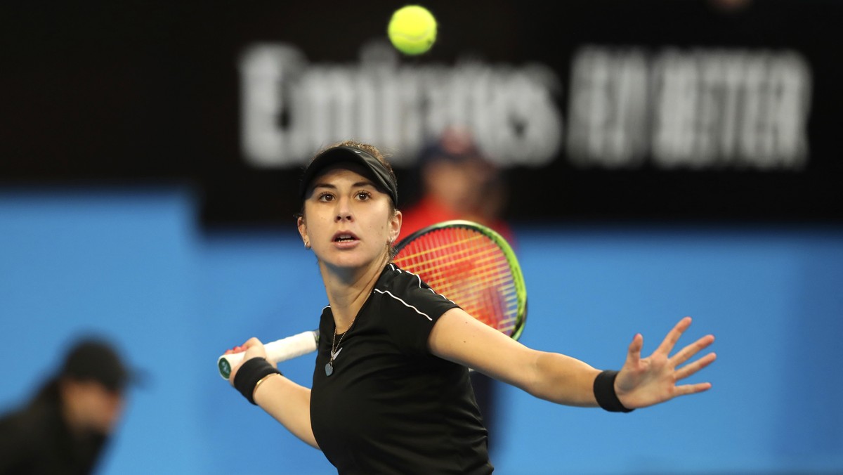 Switzerland's Belinda Bencic plays a shot during her match against Angelique Kerber of Germany in the final of the Hopman Cup tennis tournament in Perth, Australia, Saturday Jan. 5, 2019. (AP Pho ...