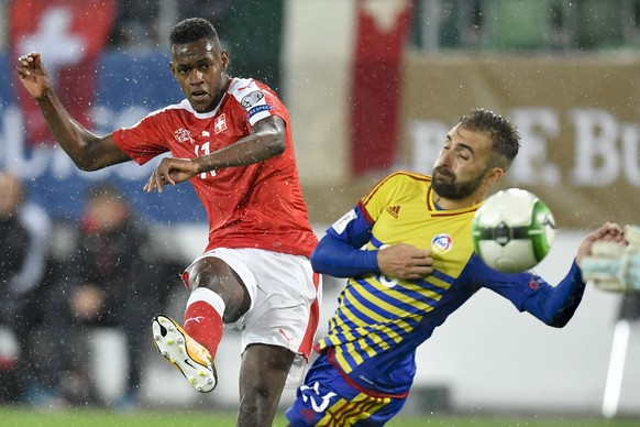 Swiss forward Edimilson Fernandes, left, fights for the ball with Andorra’s Jordi Rubio, right, during the 2018 Fifa World Cup Russia group B qualification soccer match between Switzerland and Andorra ...