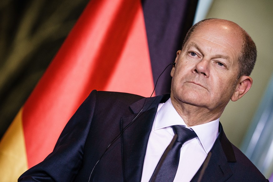 epa10445900 German Chancellor Olaf Scholz looks on during a joint press conference with Italian Prime Minister Meloni (not pictured) at the Chancellery in Berlin, Germany, 03 February 2023. Scholz and ...