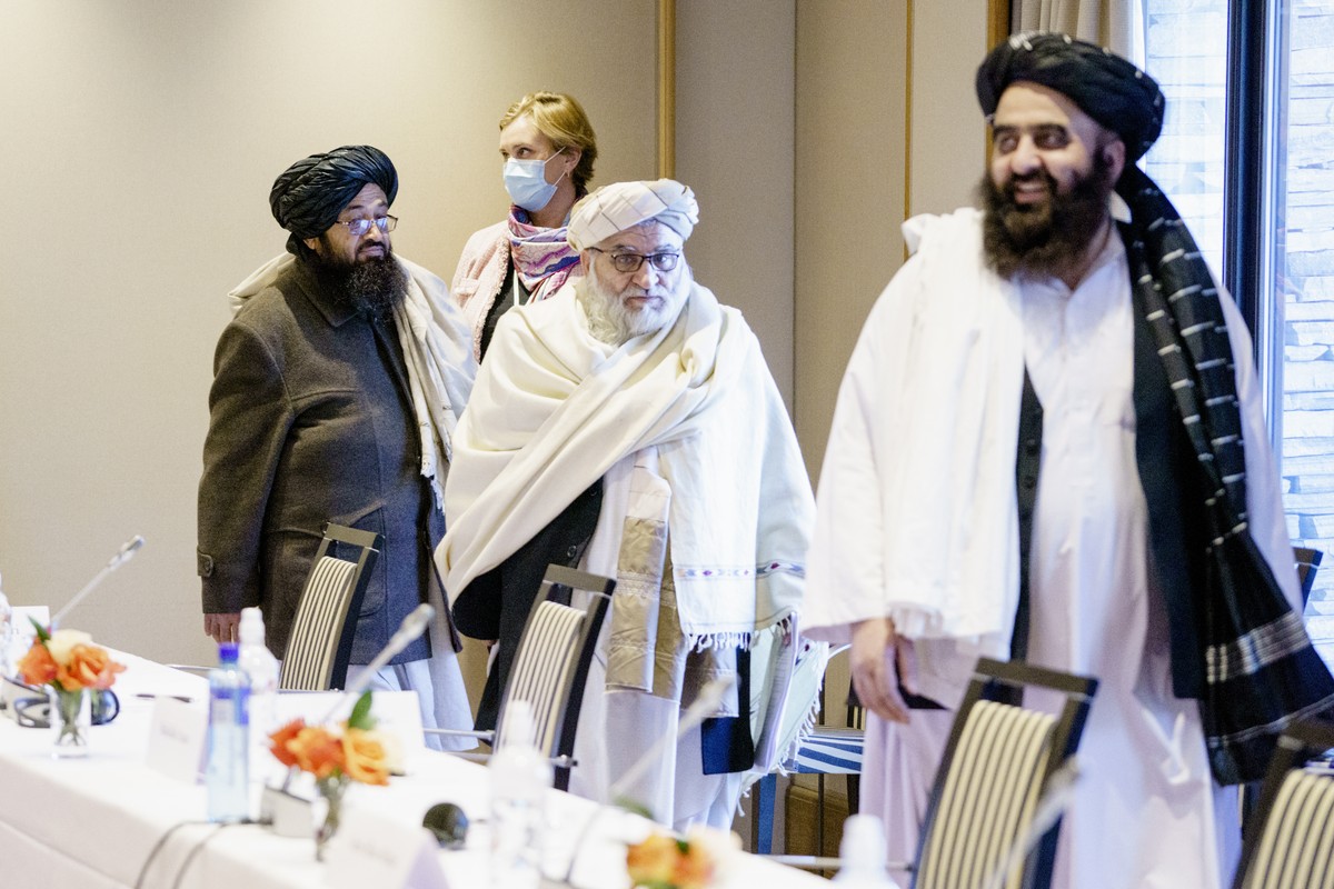 epa09708210 Representatives of the Taliban Sakhaullah Sayed, Mutiul Haq Nabi Kheel and Amir Khan Muttaqi during the meeting between Norwegian humanitarian organizations and representatives of the Tali ...