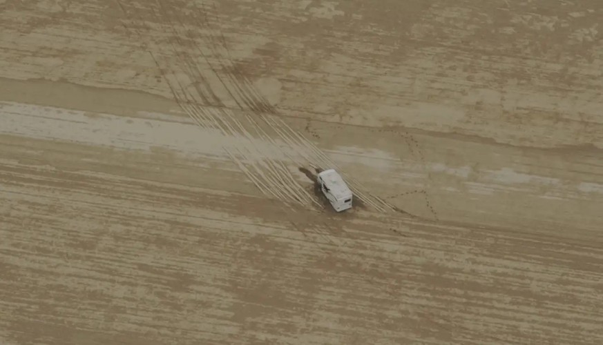 Burning Man 2023 - Cars stuck in mud.